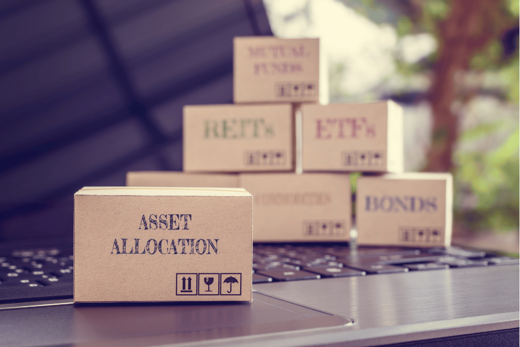 Asset allocation to diversify portfolio. Cardboard box with the words asset allocation with other boxes in the background.